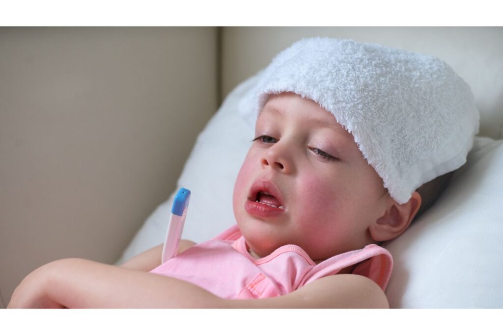 child resting at home during measles illness